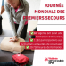 femme s'exerçant à pratiquer un massage cardiaque